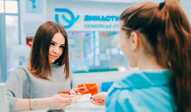 Фото - Врач с клиентом